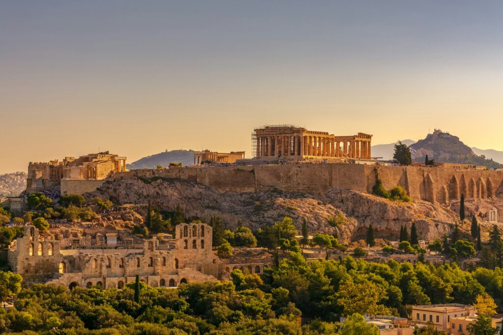 View of the Acropolis of Athens with the Parthenon and the Erechtheion from Filopappou hill at golden hour